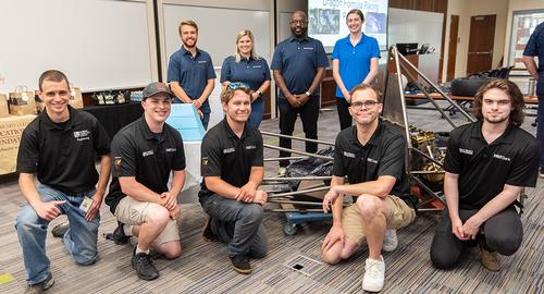 The Dragon Formula race team enjoying a party