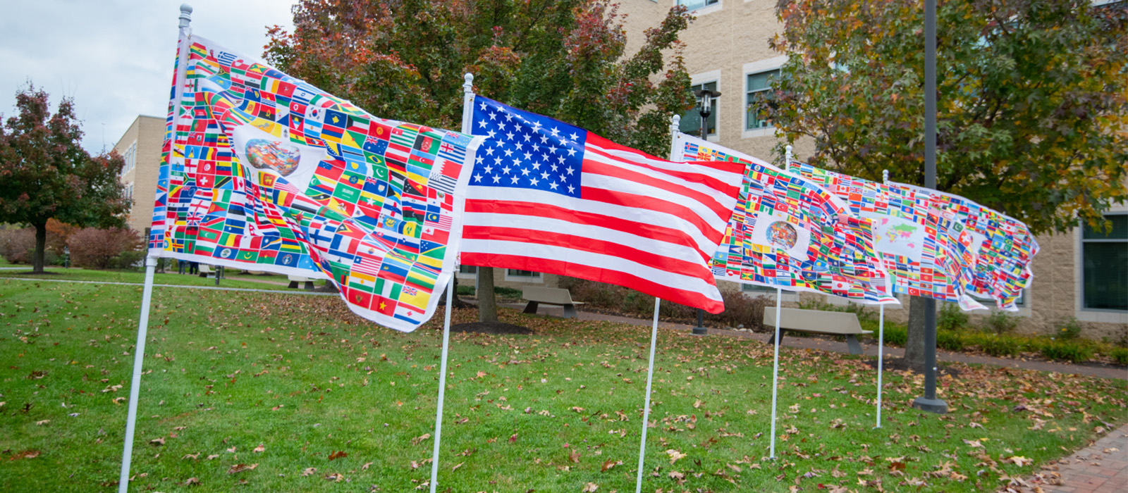 U.S. and International flags on the HCC campus