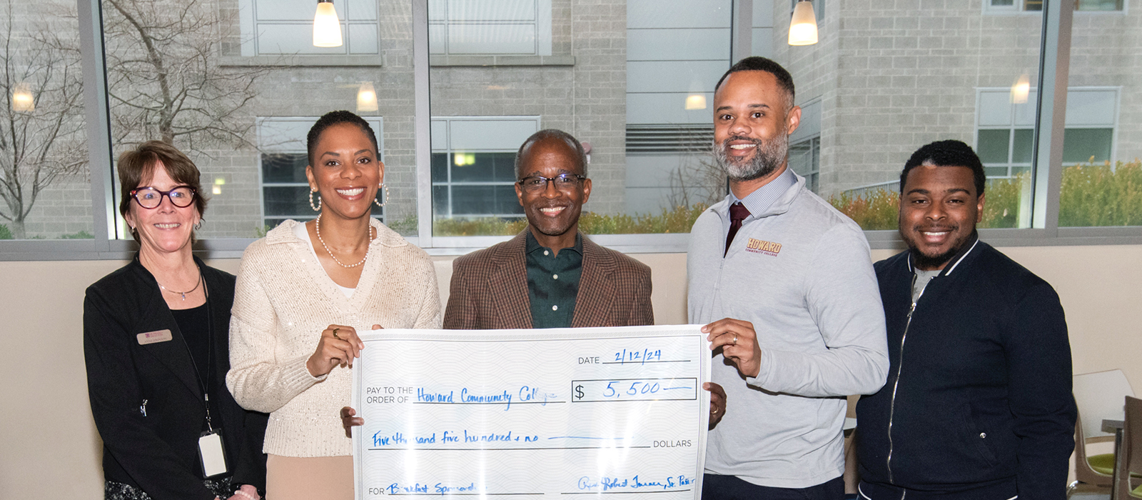 HCC leadership team with St. John Baptist Church receiving donation check