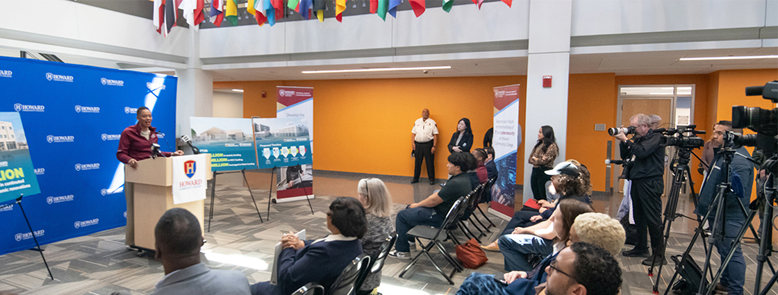 Dr. Daria J. Willis speaking at a press conference for the Workforce, Development and Trades Center.