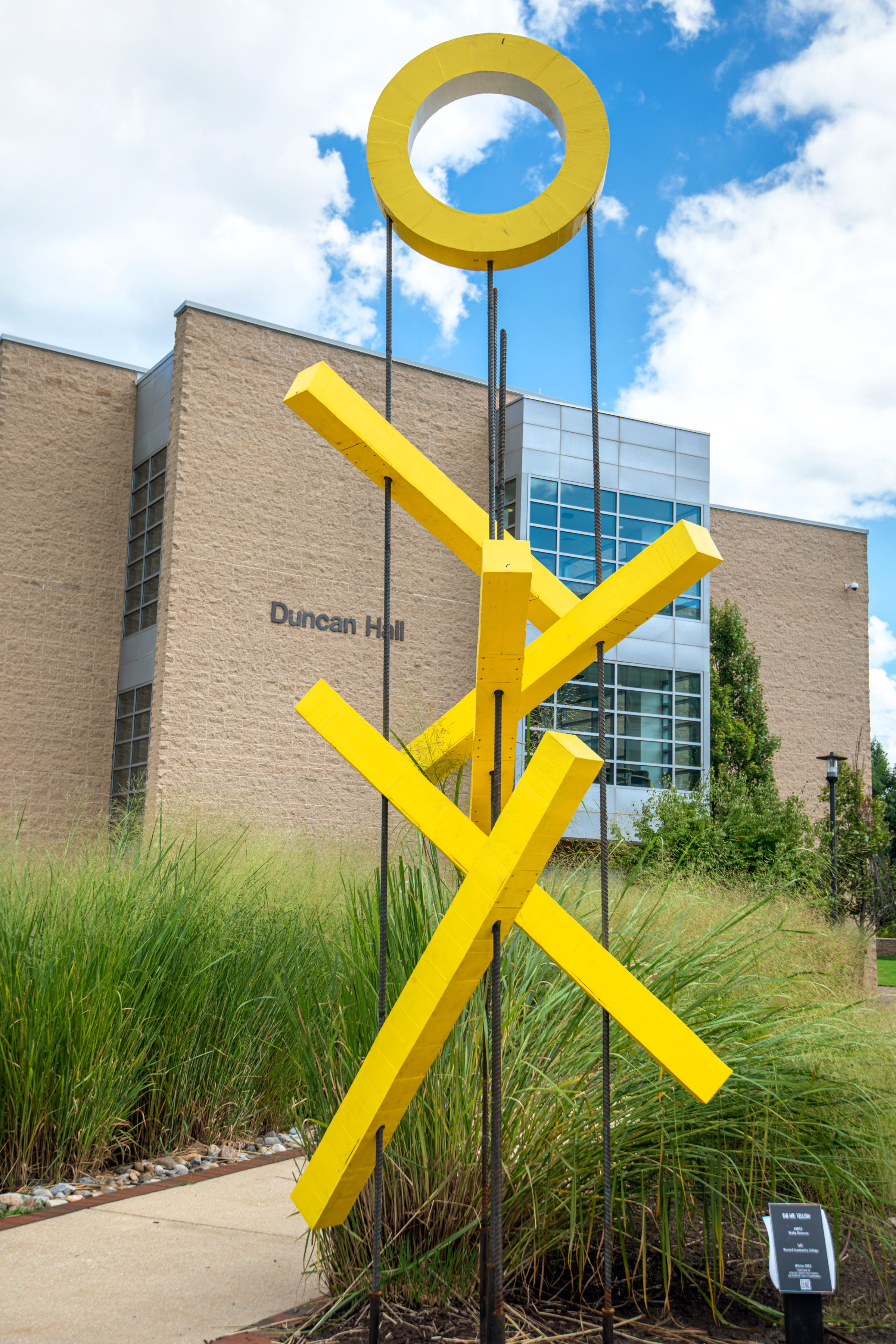 Big Mr. Yellow Sculpture of 15-foot tall yellow abstract sculpture