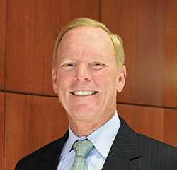 headshot of greg kahlert