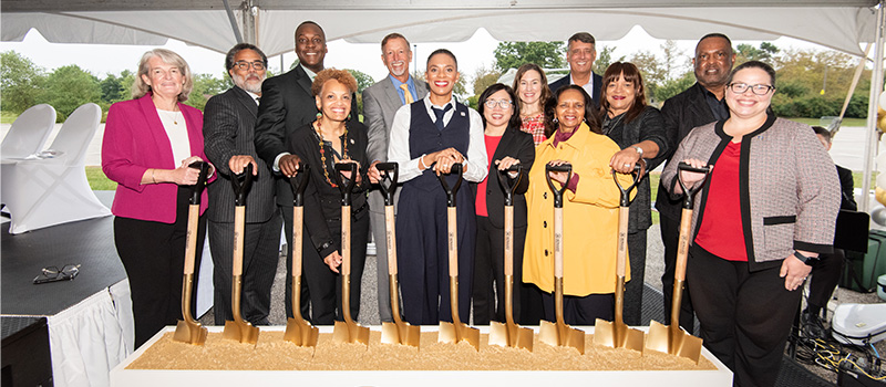 Dr. Willis and elected officials and guests pose for the ceremonial groundbreaking of the Workforce Development and Trades Center.