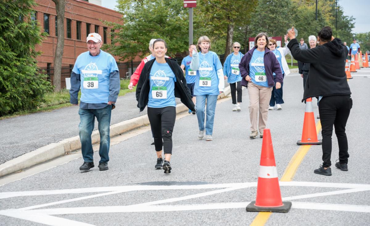People cheering on runners at the HCC challenge race