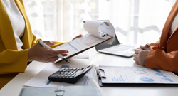 Card depicting two people who work at an accounting firm.