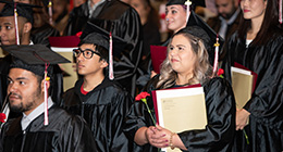 Several students at a graduation ceremony for their GED.