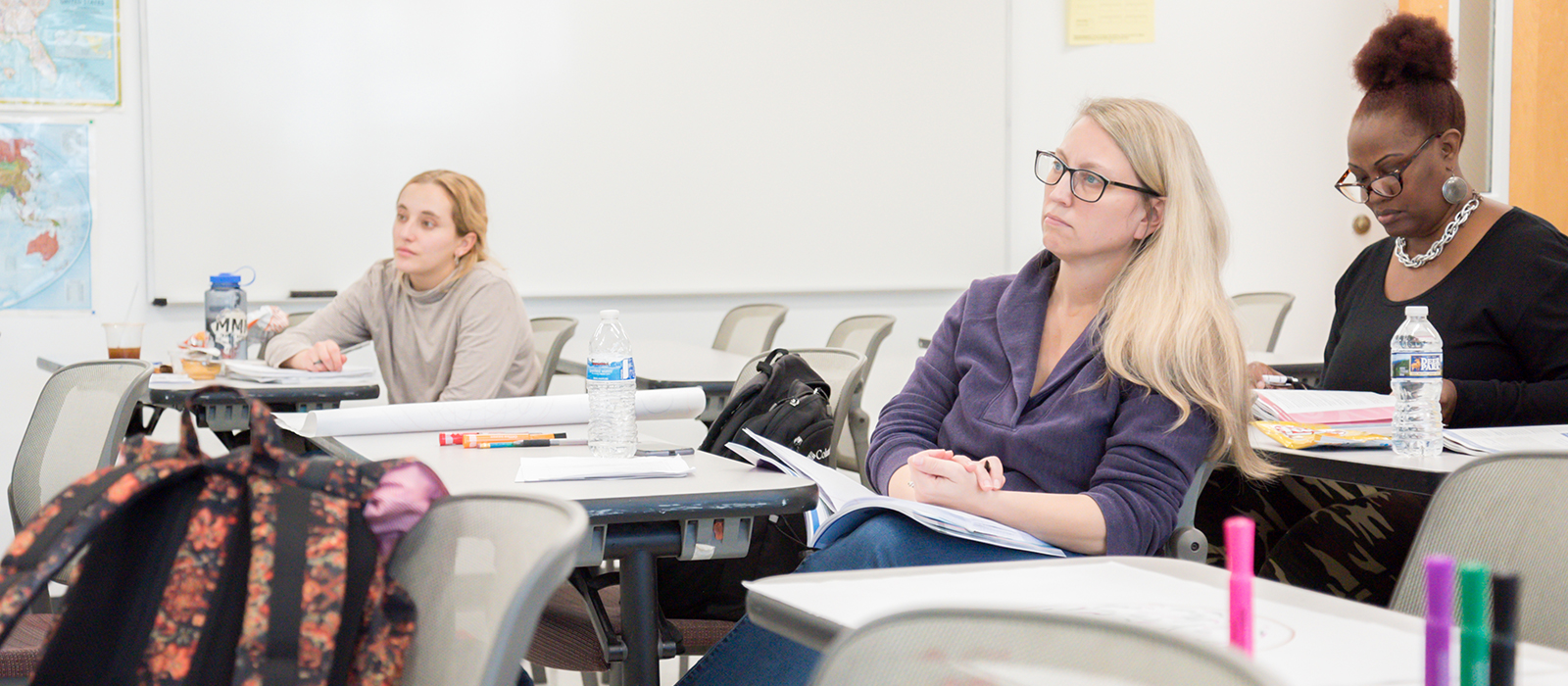 Students sitting at desks in a classroom