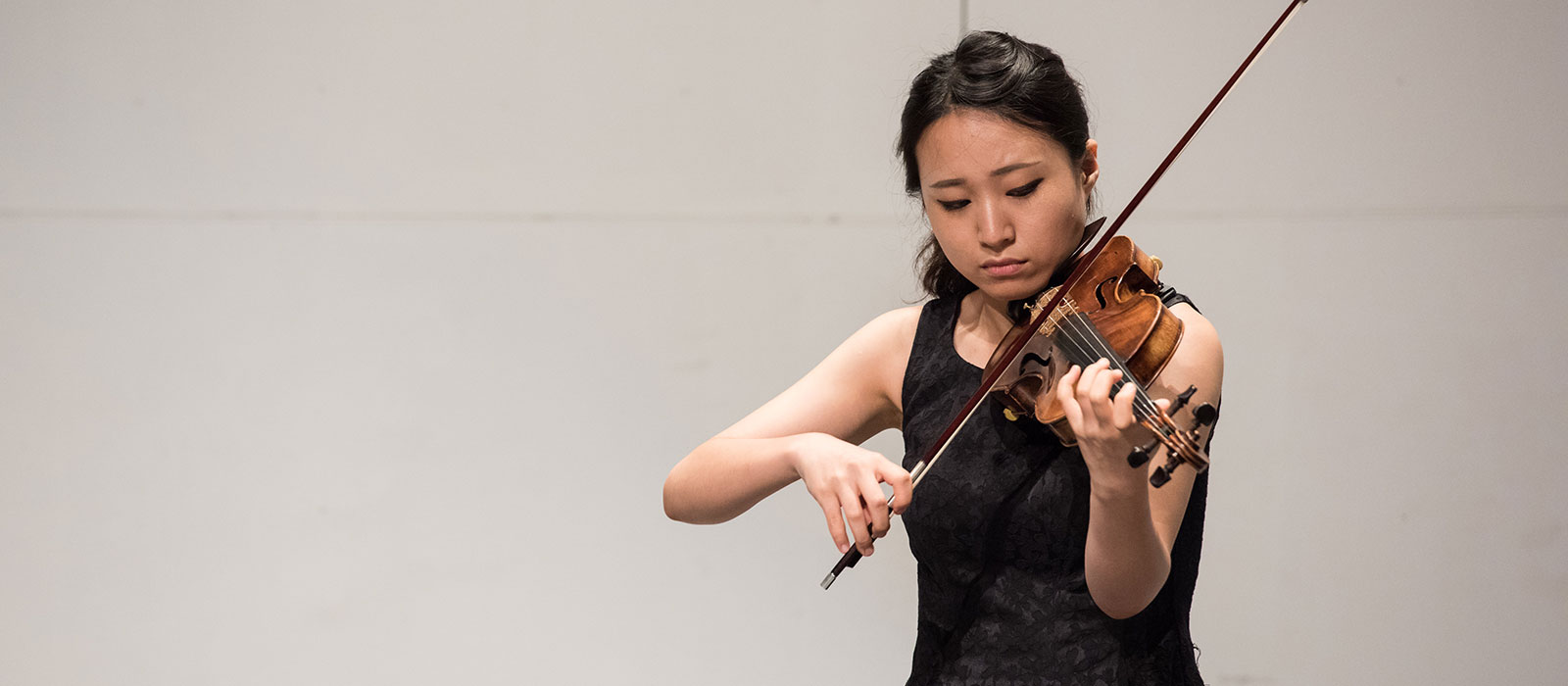 Student playing the violin